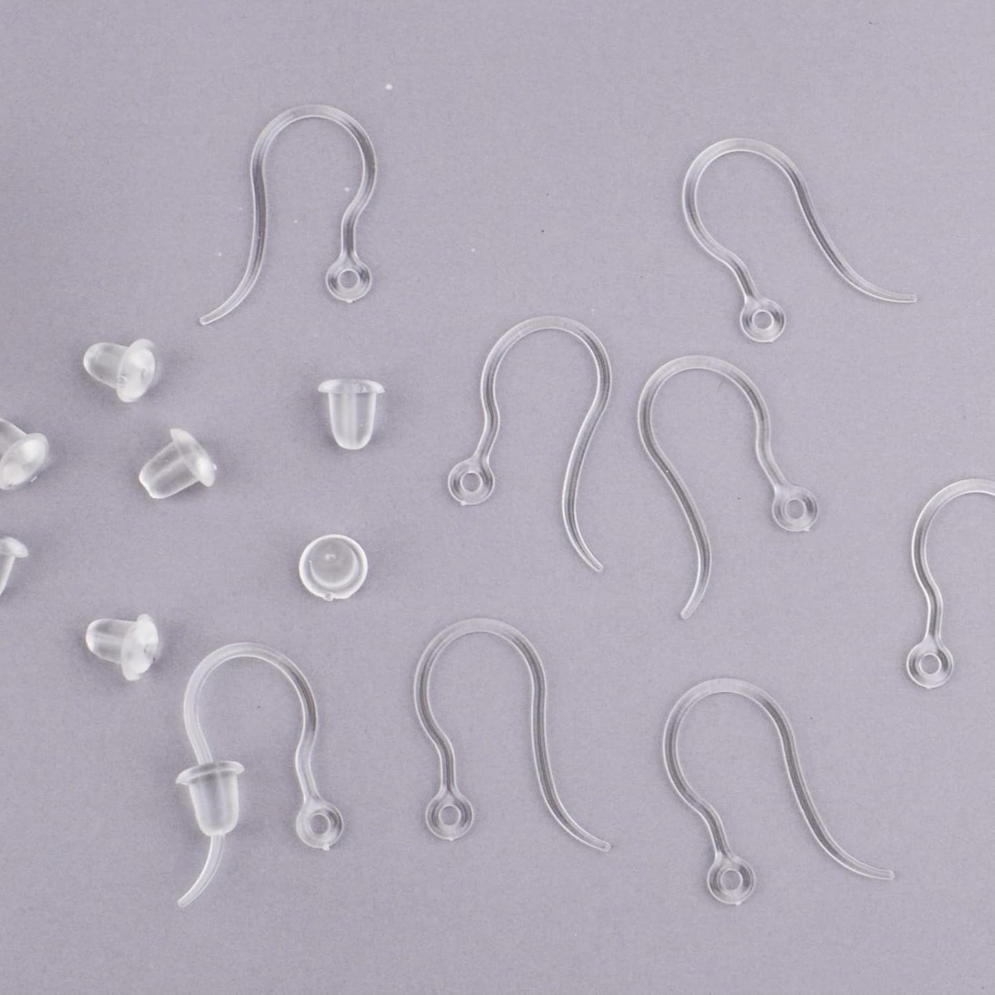 100pcs Clear Plastic Earring Hooks Ear Wire with Loop French Fish Hooks and 100pcs Transparent Earring Stoppers for DIY Earrings Jewelry Making Craft Decoration
