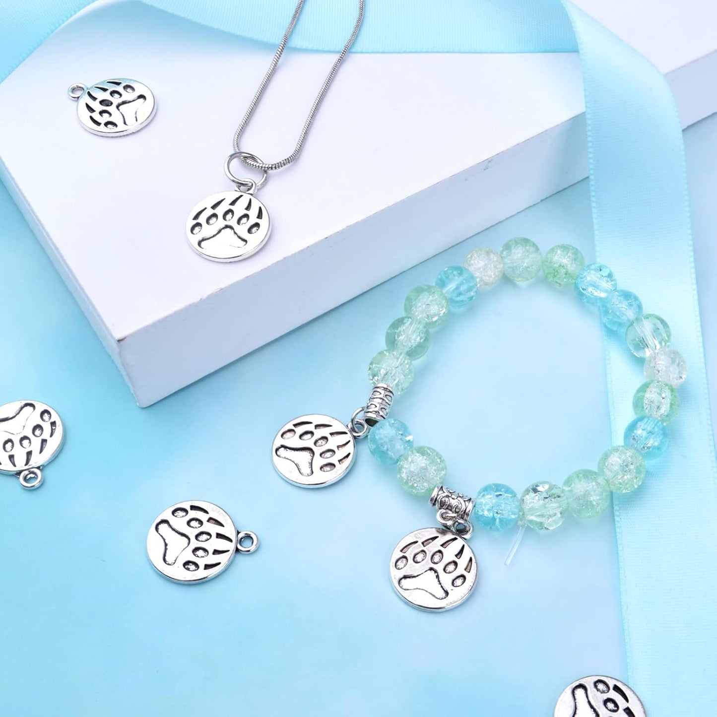 50pcs Antique Silver Paw Print Charms Alloy Dog Cat Bear Footprint Pendants Animal Paw Charms Jewelry Making Accessories for DIY Earrings Necklace Bracelet and Crafting
