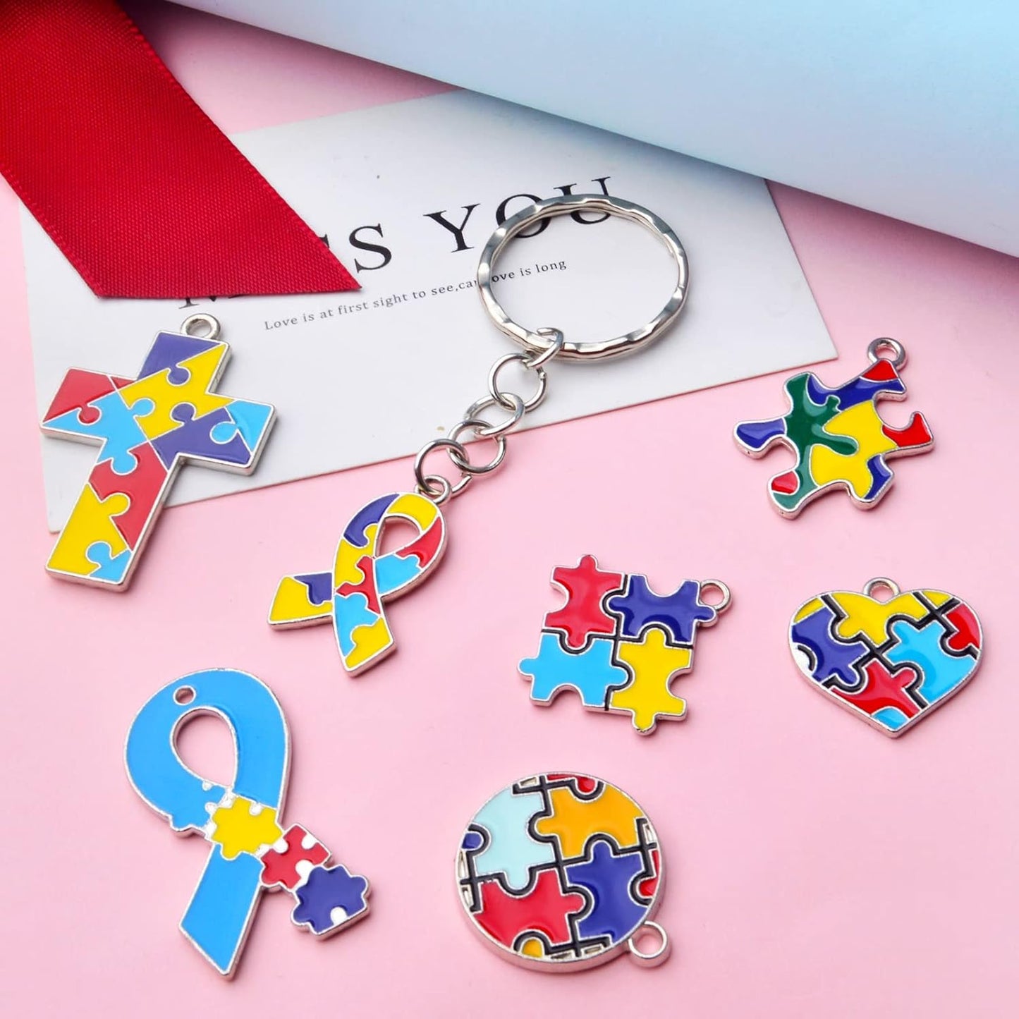 16pcs 8 Styles Autism Charms Mixed Jigsaw Puzzle Pendants Autistic Awareness Charms with 50pcs 5mm Open Jump Rings for DIY Crafts Necklace Bracelet Jewelry Making Supplies