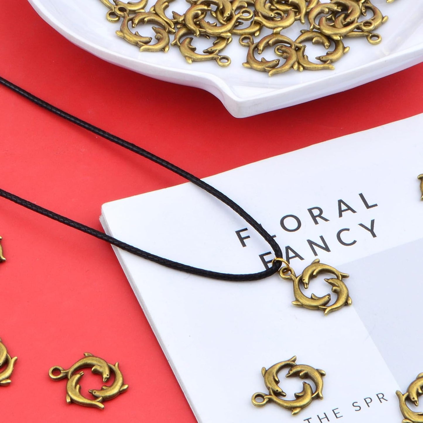50pcs Antique Bronze Animal Dolphin Charms Tibetan Alloy Sea Life Dolphin Shape Dangle Pendants Craft Supplies for DIY Necklace Bracelet Jewelry Making Findings