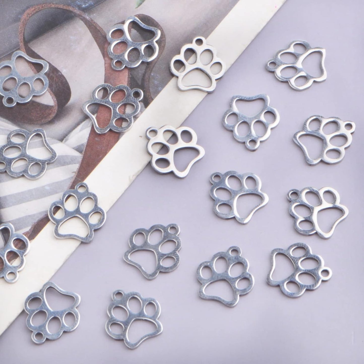 20 Pieces Stainless Steel Dog Paw Print Charms Hollow Lovely Pet Doggy Cat Animal Footprint Dangle Pendants for DIY Necklace Bracelet Jewellery Making Crafting