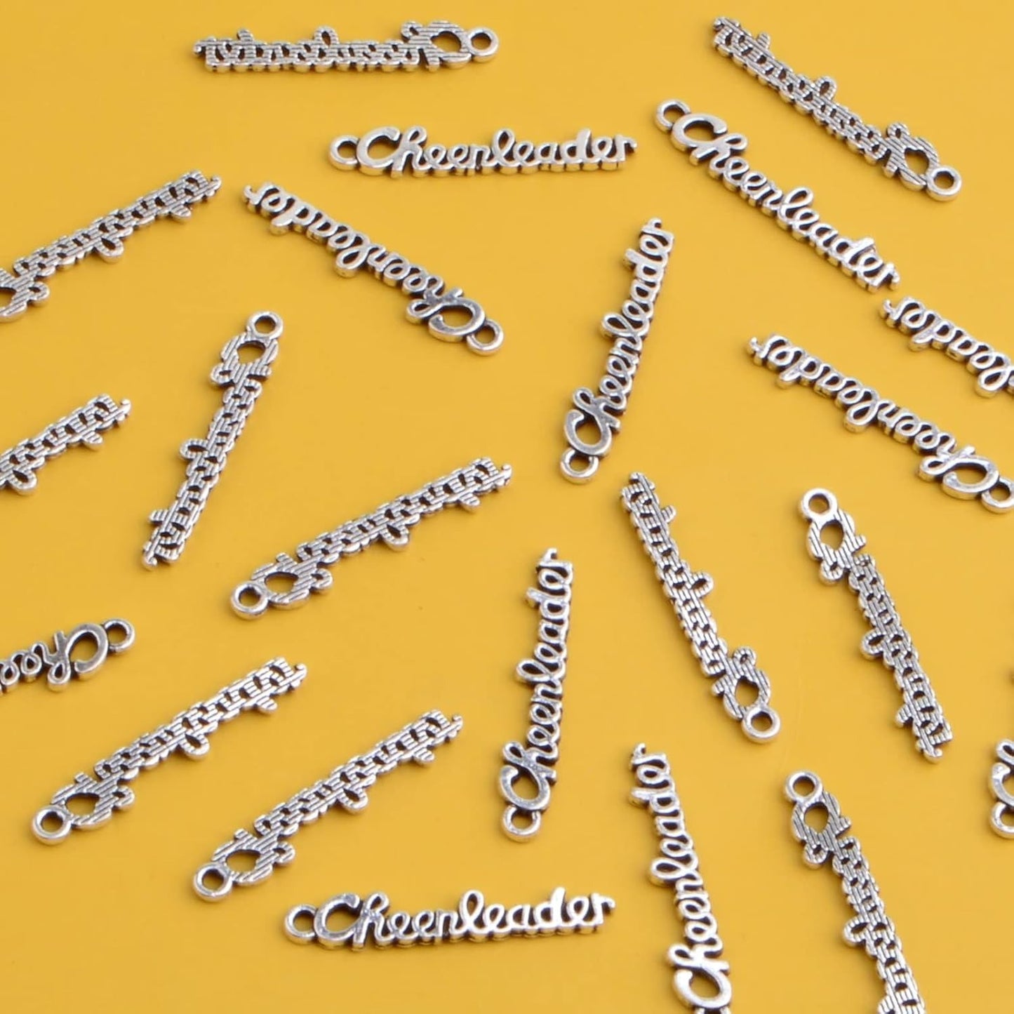 50pcs Antique Silver Letter Cheerleader Charms Alloy Sports Cheerleader Charm Pendants Craft Supplies for DIY Necklace Bracelet Jewelry Making Findings Gifts