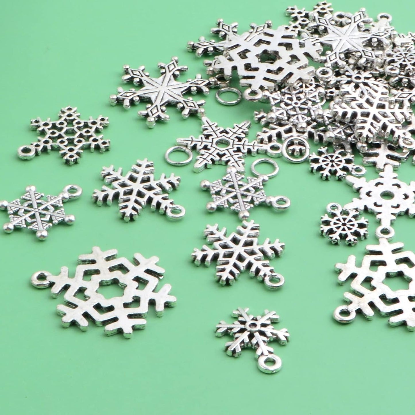 40pcs Antique Silver Mixed Snowflake Charms Alloy Christmas Snowflake Pendants and 40pcs White K Open Jump Rings with a Plastic Box for DIY Bracelet Jewelry Making Supplies